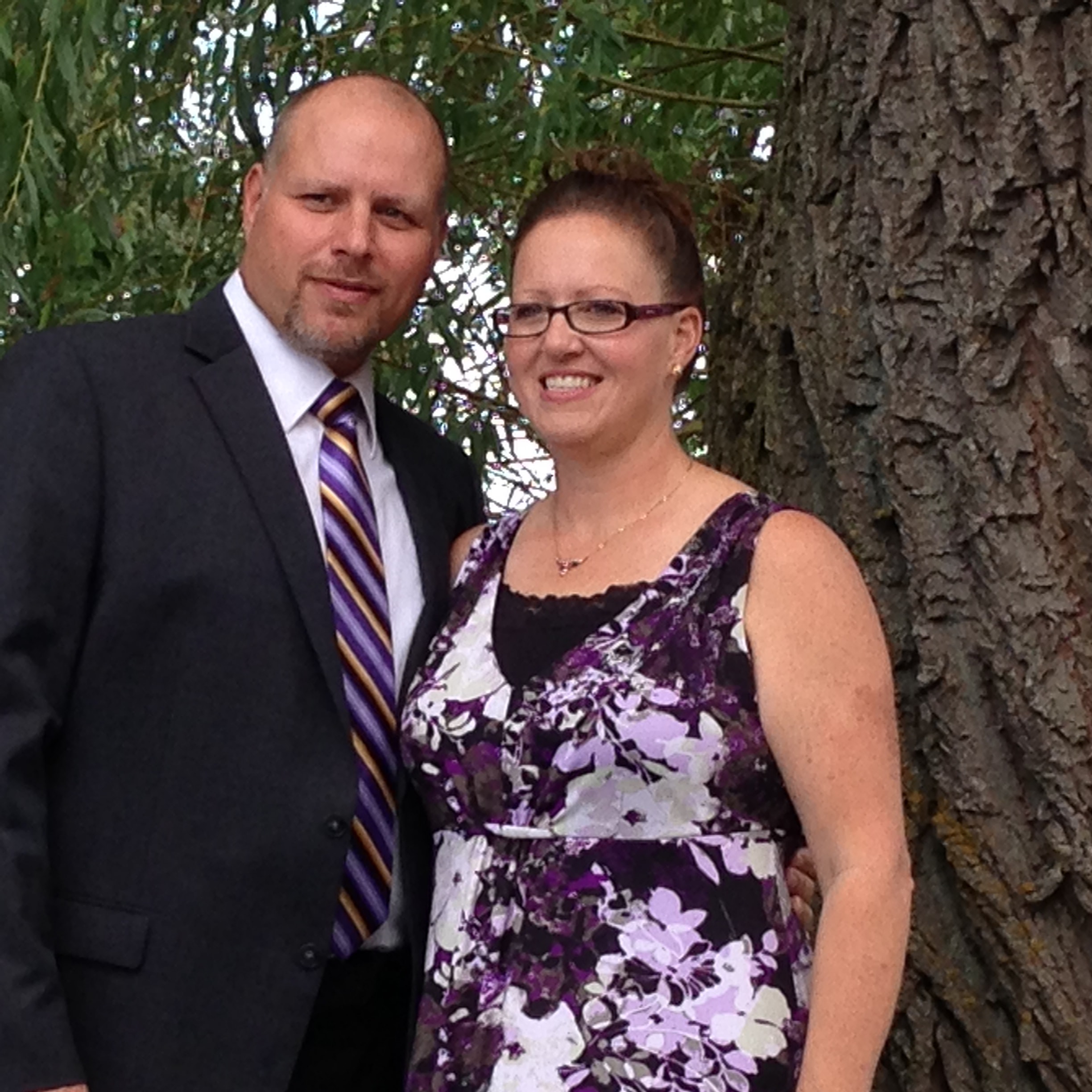 Michelle in 2016 with her husband outdoors
